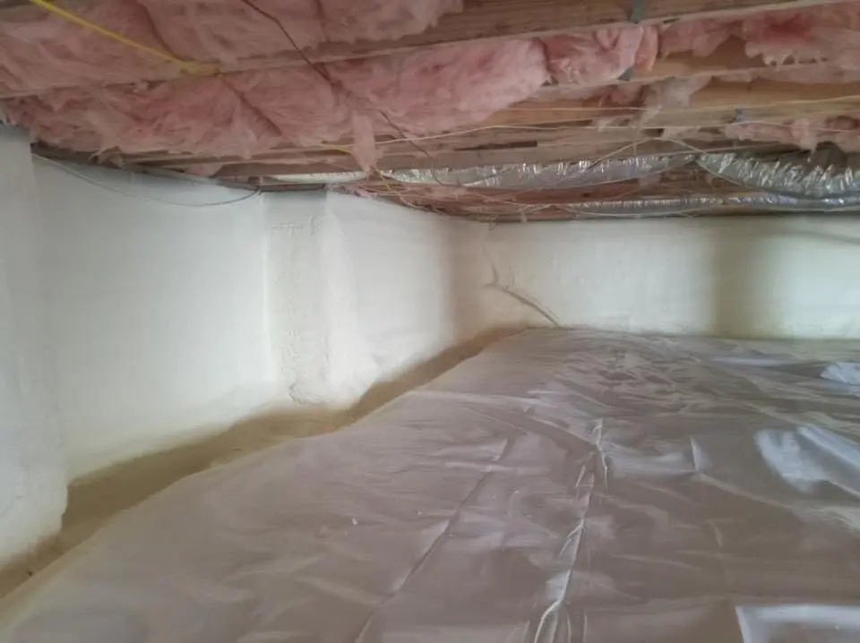 Crawl space encapsulation with closed-cell spray foam for Commercial Roof Restoration in Tonganoxie